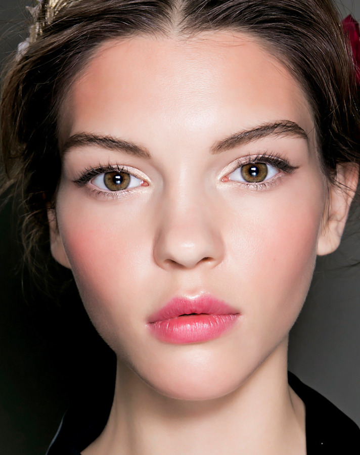 girl flushed cheeks clear skin