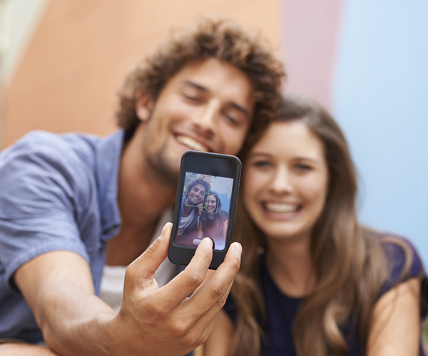 Couples take #firstdateselfie.