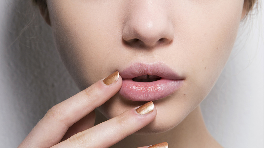 pretty model touching face