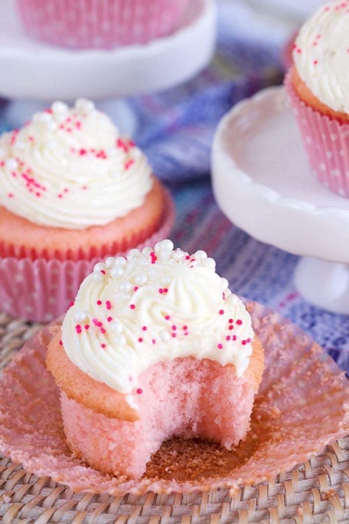 STYLECASTER | 25 Festive Recipes That Will Impress Your Friends on New Year’s Eve | Pink Champagne Cupcakes
