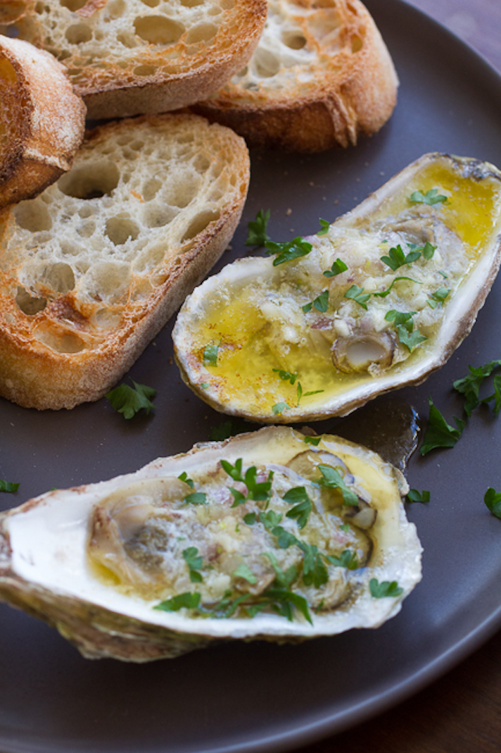 STYLECASTER | 25 Festive Recipes That Will Impress Your Friends on New Year’s Eve | Broiled Oysters