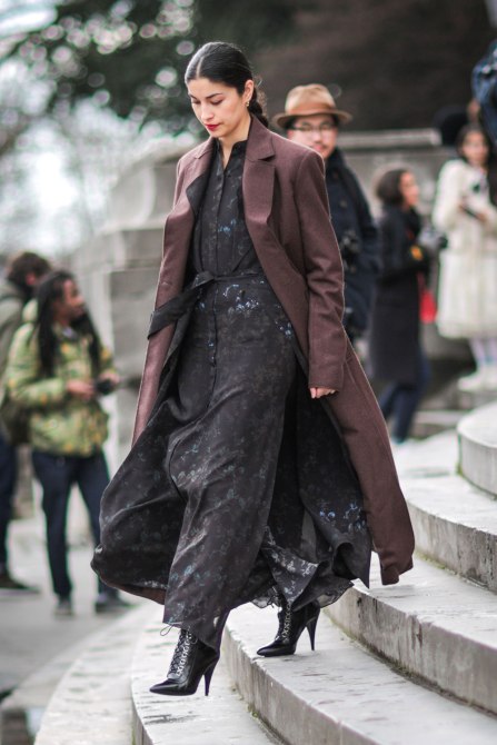 STYLECASTER | How to Wear Clashing Colors | Black Dress with Brown Long Coat