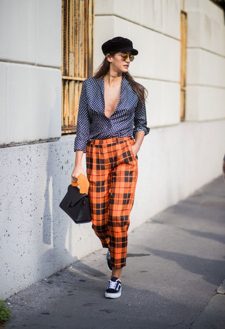 STYLECASTER | How to Wear Clashing Colors | Blue Button Down with White Polka Dots and Orange Plaid Pants