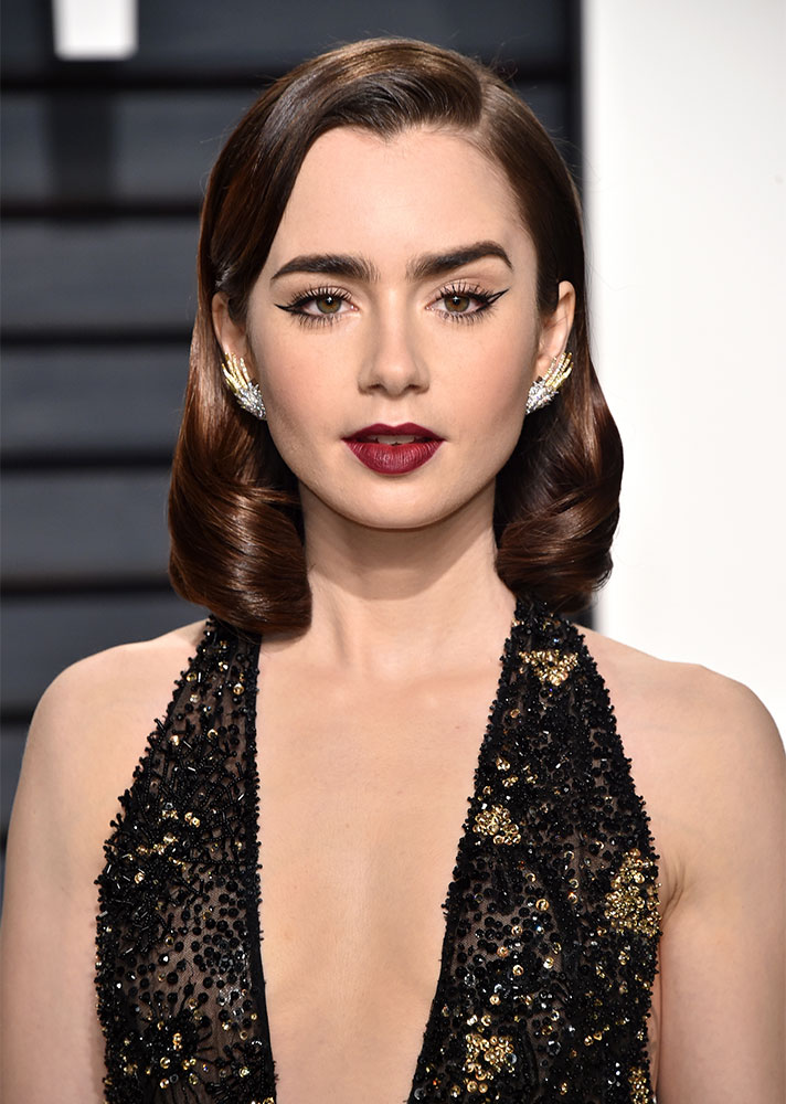 STYLECASTER | Celebs Who Elevated the Basic Cat Eye | Lily Collins