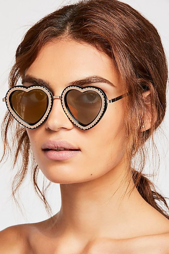 STYLECASTER | Winter Sunglasses Are the Underrated Accessory You Can't Overlook
