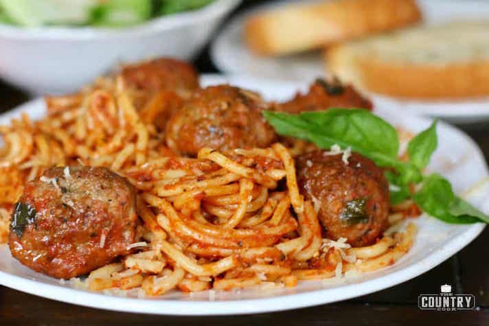 STYLECASTER | Slow-Cooker Pastas Are the Easiest Way to Indulge in a Lazy, Decadent Meal This Summer | Spaghetti and Meatballs