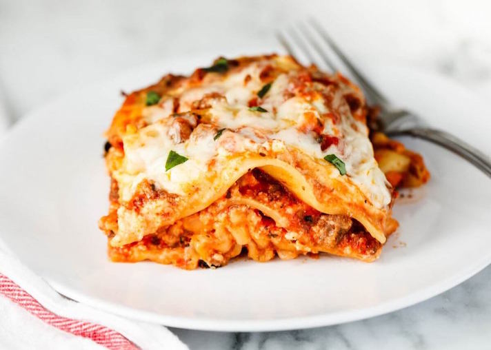 STYLECASTER | Slow-Cooker Pastas Are the Easiest Way to Indulge in a Lazy, Decadent Meal This Summer | Lasagna
