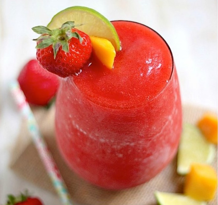STYLECASTER | 17 Big-Batch Margarita Recipes So Good You'll Be Tempted to Whip 'Em Up Every Day This Summer | Strawberry Mango Margaritas