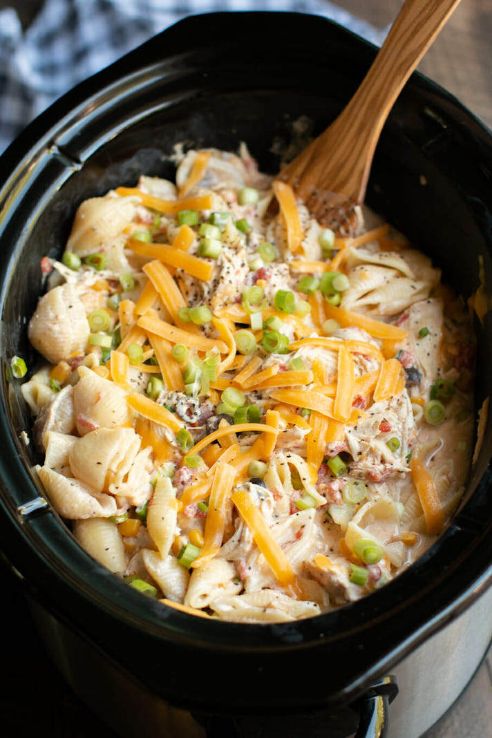 STYLECASTER | Slow-Cooker Pastas Are the Easiest Way to Indulge in a Lazy, Decadent Meal This Summer | Southwestern Cheesy Chicken Pasta