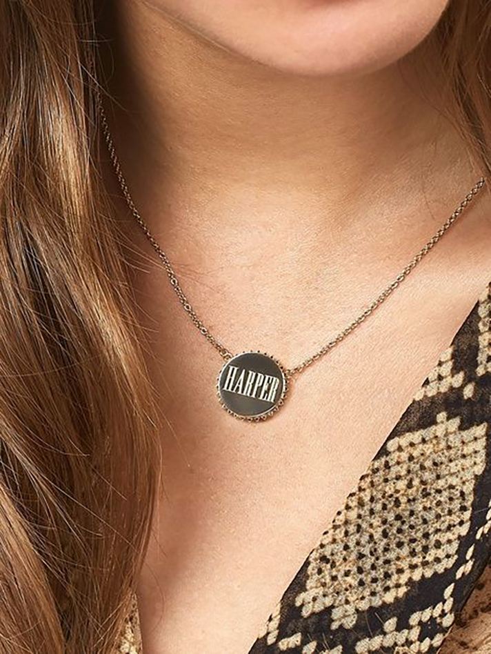 STYLECASTER | Word and Name Jewelry Is Having a Moment, Because Carrie Bradshaw Is a Forever Fashion Icon