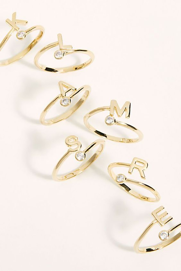 STYLECASTER | Word and Name Jewelry Is Having a Moment, Because Carrie Bradshaw Is a Forever Fashion Icon