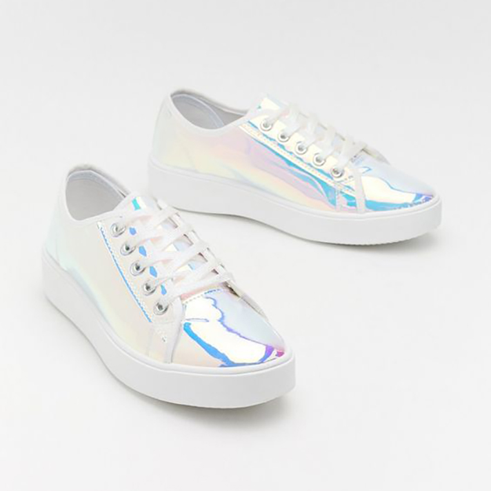 STYLECASTER | Dainty White Sneakers You Could Definitely Wear Under Your Bridal Gown