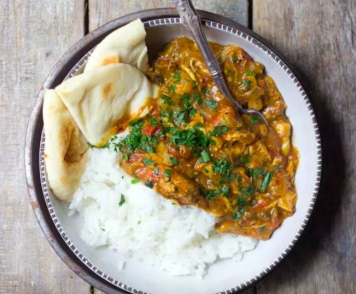 STYLECASTER | 17 Slow-Cooker Indian Recipes That Are Better Than Takeout | Spicy Chicken Vindaloo