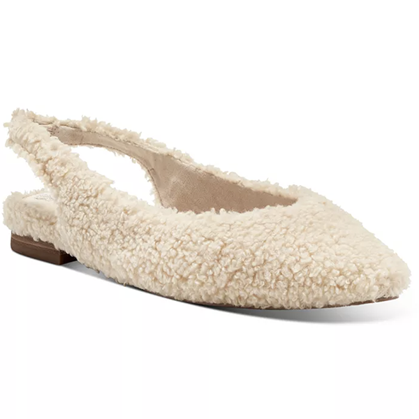 A slingback flat lined with off-white bouclé fabric