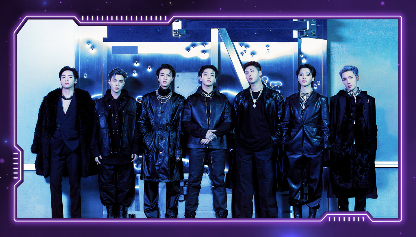 Members of BTS standing in a row with leather jackets