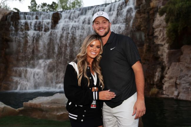 Josh Allen and Brittany Williams pose during Capital One's The Match VI - Brady & Rodgers v Allen & Mahomes at Wynn Golf Club on June 01, 2022 in Las Vegas, Nevada.