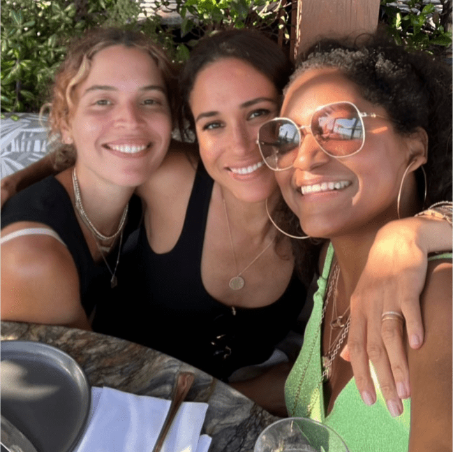 Meghan Markle pictured with Kadi Lee and Cleo Wade.