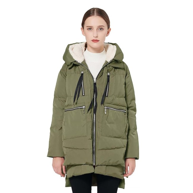 A model wearing the Orolay Women's Thickened Down Jacket in green
