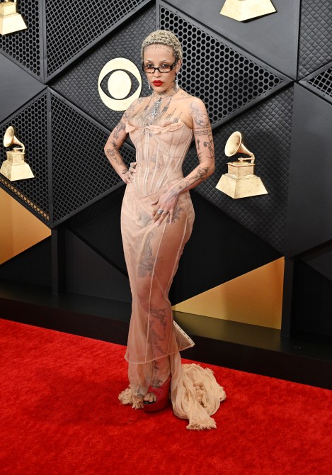 Doja Cat in a beige corset gown on the 2024 Grammys red carpet