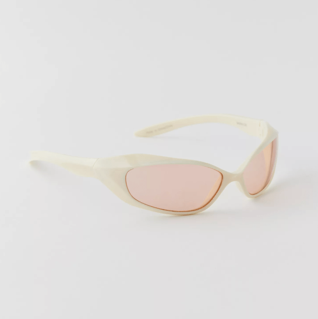 White futuristic sunglasses with pastel pink lenses