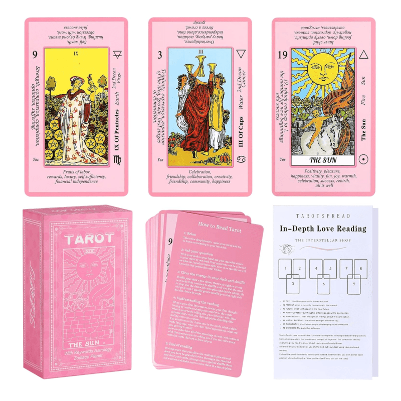 Three pink tarot cards, a pink tarot box, and two information cards
