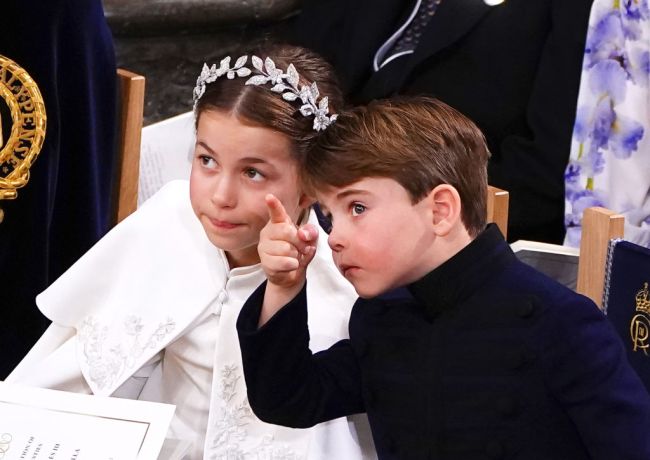 Britain's Prince Louis and Princess Charlotte attend the Coronation of King Charles III and Queen Camilla at Westminster Abbey on May 6, 2023 in London, England. The Coronation of Charles III and his wife, Camilla, as King and Queen of the United Kingdom of Great Britain and Northern Ireland, and the other Commonwealth realms takes place at Westminster Abbey today. Charles acceded to the throne on 8 September 2022, upon the death of his mother, Elizabeth II.