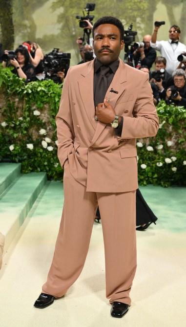 US musician and actor Donald Glover arrives for the 2024 Met Gala at the Metropolitan Museum of Art on May 6, 2024, in New York. The Gala raises money for the Metropolitan Museum of Art's Costume Institute. The Gala's 2024 theme is "Sleeping Beauties: Reawakening Fashion."