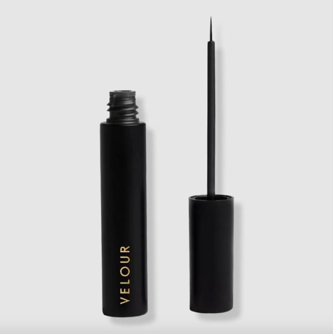 Velour Lashes Black Adhesive in a black tube.