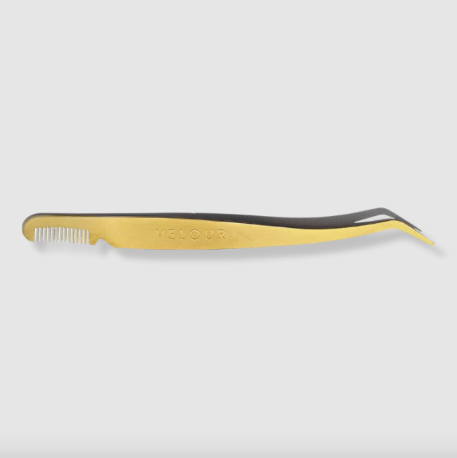 Velour Lashes Too Easy Lash Applicator a gold lash applicator with a comb on the end.
