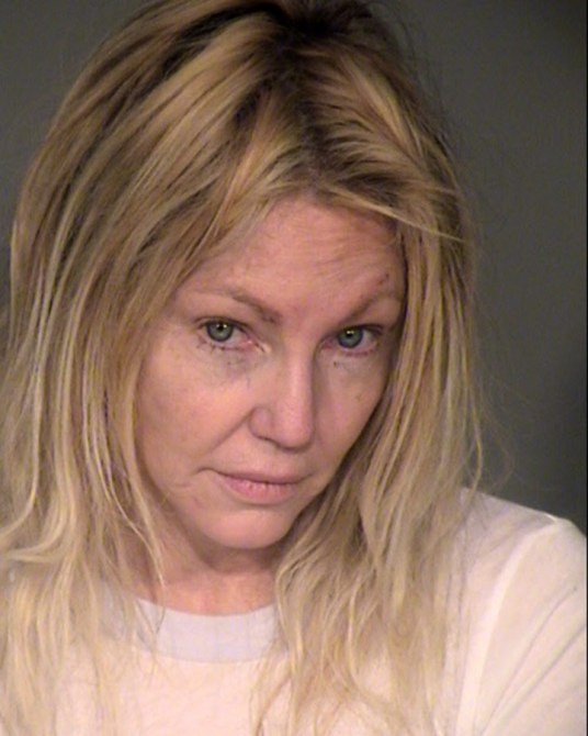 Best quality available) In this handout photo provided by the Ventura County Sheriffs Office, actress Heather Locklear is seen in a police booking photo after her arrest on charges of suspicion of domestic battery and assaulting a peace officer February 25, 2018 in Ventura, California.  Police were called to Locklears Thousand Oaks home after reports of a domestic battery.  Locklear was released after posting bail.