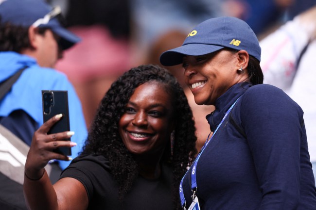 Candi Gauff (R), mother of USA's Coco Gauff, attends her daughters women's singles match against Poland's Magdalena Frech on day eight of the Australian Open tennis tournament in Melbourne on January 21, 2024.