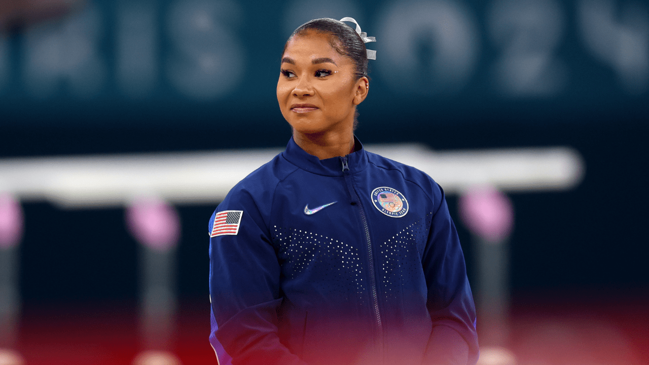 Bronze medalist Jordan Chiles of Team United States celebrates on the podium at the Artistic Gymnastics Women's Floor Exercise Medal Ceremony on day ten of the Olympic Games Paris 2024 at Bercy Arena on August 05, 2024 in Paris, France.