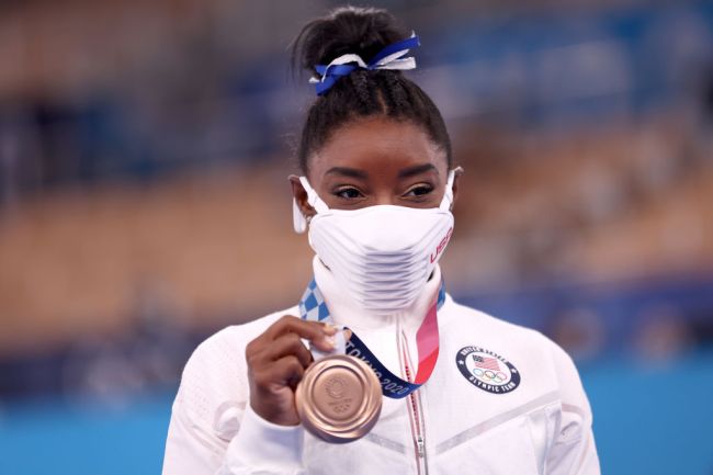 Simone Biles of Team United States poses with the bronze medal during the Women's Balance Beam Final medal ceremony on day eleven of the Tokyo 2020 Olympic Games at Ariake Gymnastics Centre on August 03, 2021 in Tokyo, Japan.