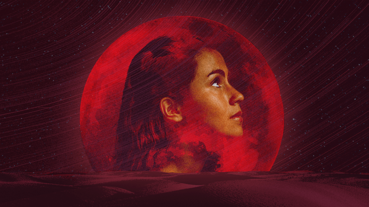 A woman's profile in front of a bright red lunar eclipse full moon