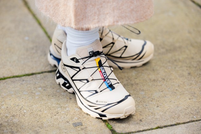 Hollie Mercedes Peters wears Salomon sneakers outside Holzweiler during London Fashion Week February 2024 on February 18, 2024 in London, England.