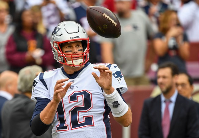 New England Patriots quarterback Tom Brady (12) warms up prior to action against the Washington Redskins at FedEx Field.