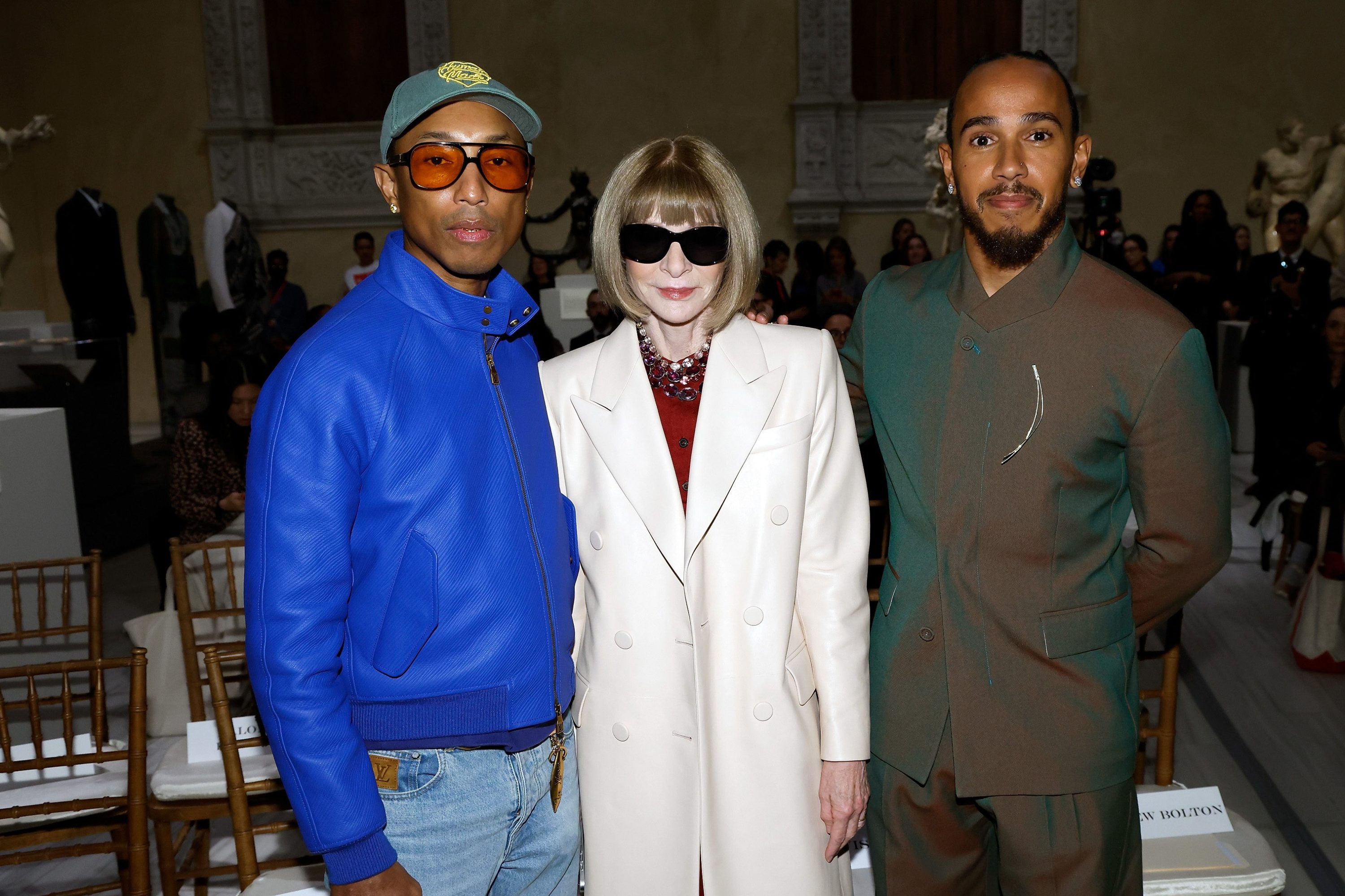 Pharrell Williams, Anna Wintour, and Lewis Hamilton attend a press conference announcing the Spring 2025 Costume Institute exhibition "Superfine: Tailoring Black Style" at Metropolitan Museum of Art on October 09, 2024 in New York City.
