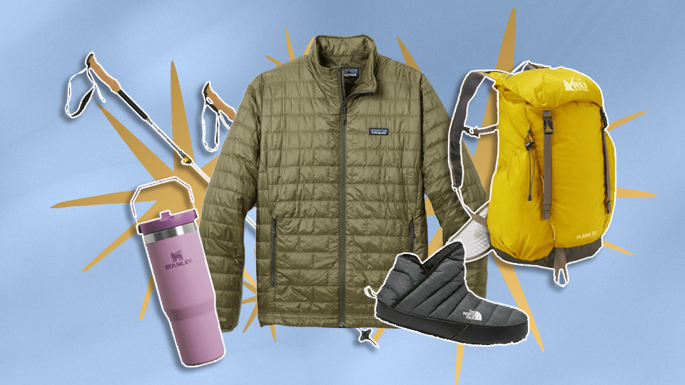 Left to Right: Light purple Stanley Tumbler, REI Co-op traverse poles, army green insulated Patagonia jacket, dark gray The North Face booties, yellow REI Co-op hiking backpack.