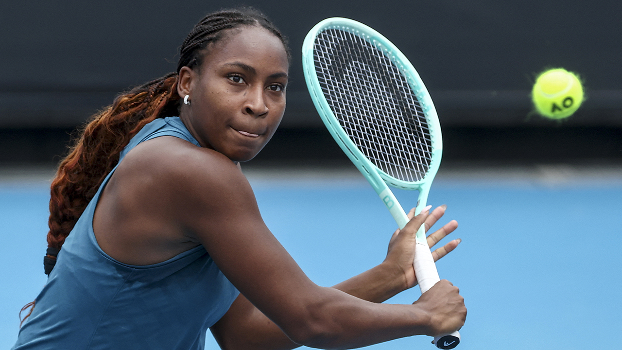 USA's Coco Gauff hits a return during a training session ahead of the Australian Open tennis tournament in Melbourne on January 9, 2025. (Photo by DAVID GRAY / AFP) / -- IMAGE RESTRICTED TO EDITORIAL USE - STRICTLY NO COMMERCIAL USE