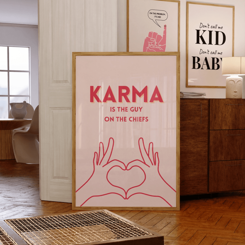 A framed :Karma is the Guy On The Chiefs" poster from Etsy