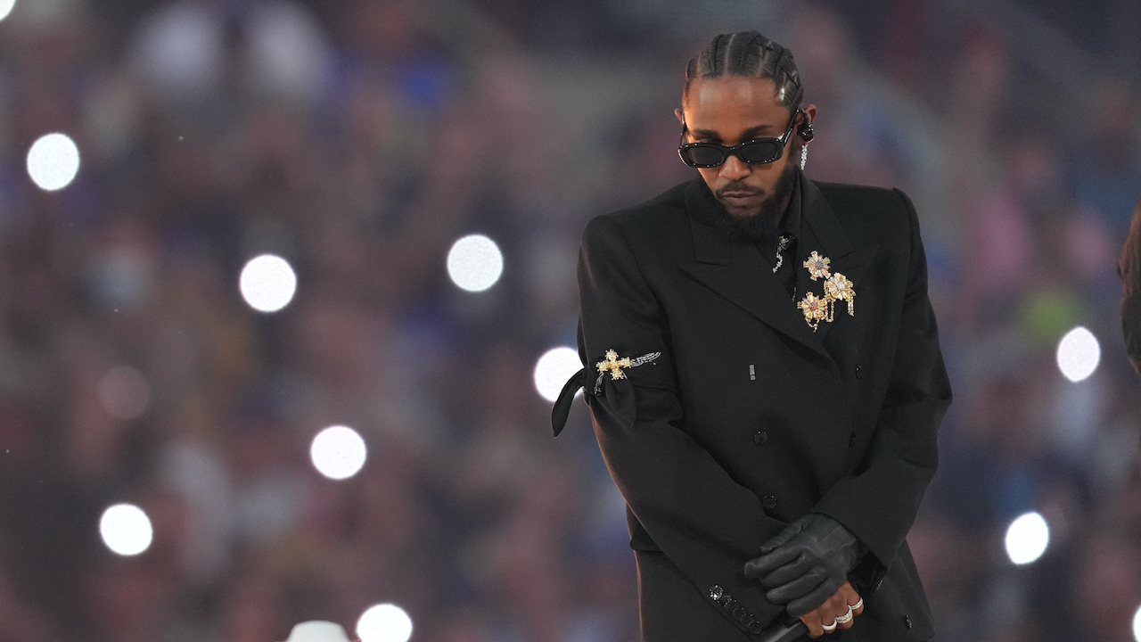 Kendrick Lamar performing at Super Bowl LVI halftime show in 2022, returning as main headliner for Super Bowl 2025's halftime performance.