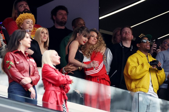 LAS VEGAS, NEVADA - FEBRUARY 11: Rapper Ice Spice, Singer Taylor Swift and Actress Blake Lively hug prior to Super Bowl LVIII between the San Francisco 49ers and Kansas City Chiefs at Allegiant Stadium on February 11, 2024 in Las Vegas, Nevada. (Photo by Ezra Shaw/Getty Images)