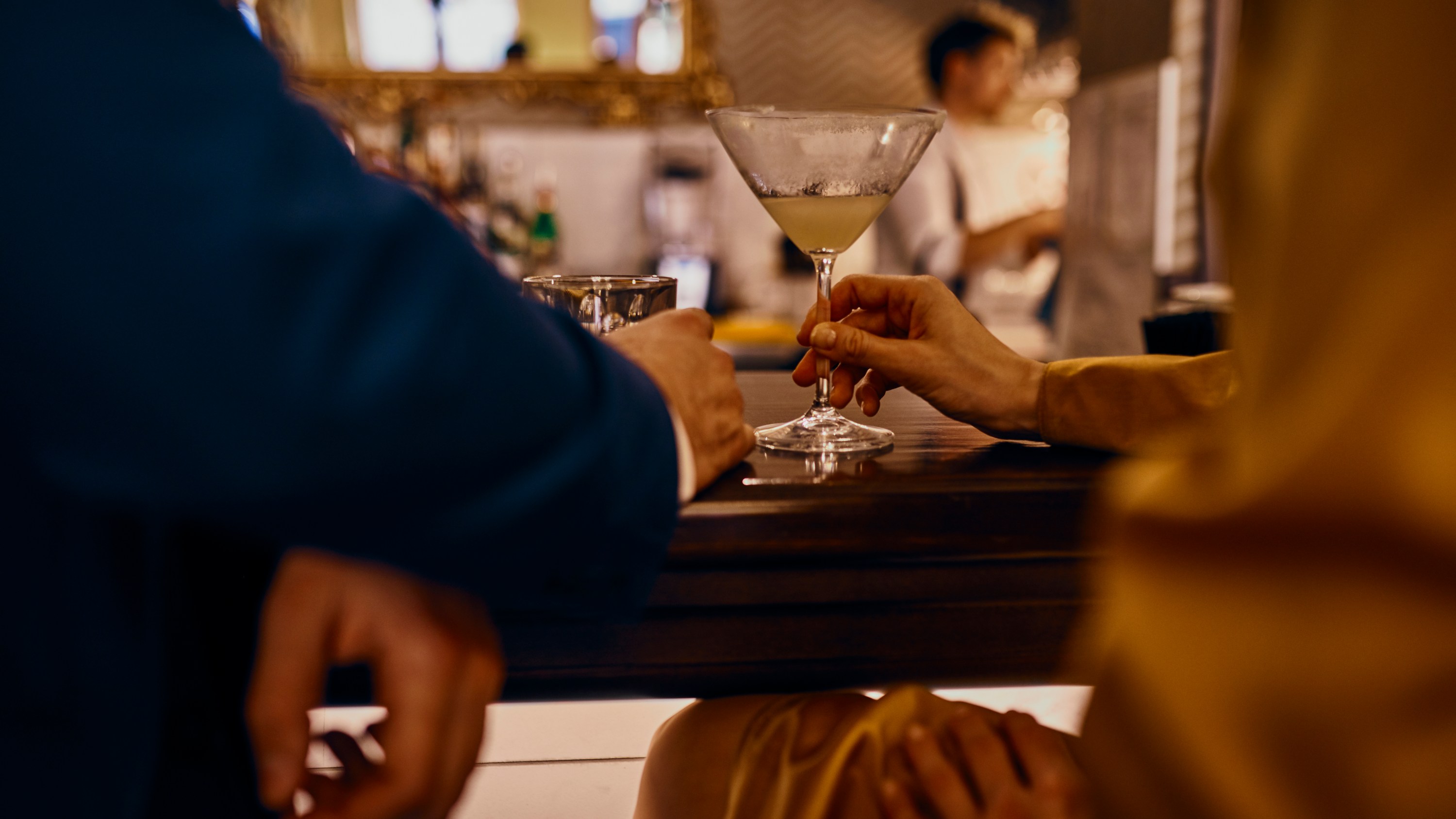 A couple sharing a drink