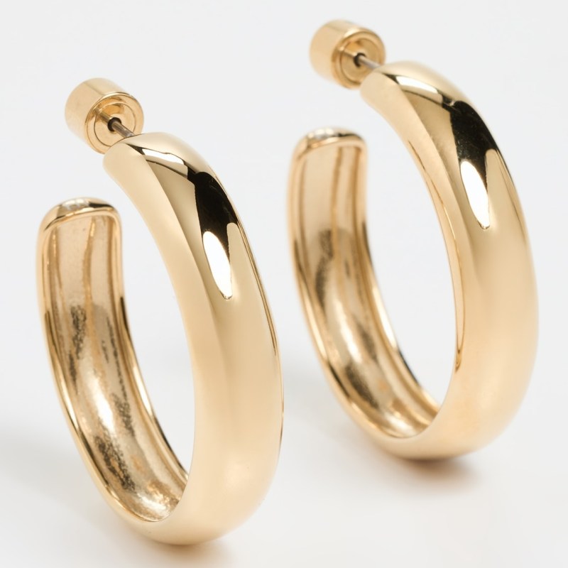 We Found Similar Items to Taylor Swift's Miu Miu Skirt & Cartier Watch