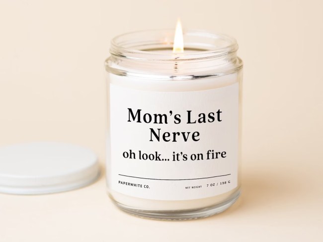 A lit candle with the text 'Mom's Last Nerve, oh look...it's on fire'