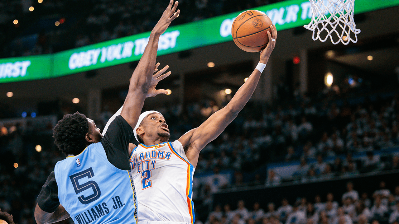 Shai Gilgeous-Alexander #2 of the Oklahoma City Thunder shoots the ball around Vince Williams Jr. #5 of the Memphis Grizzlies in the third quarter during Game One of the Western Conference First Round NBA Playoffs at Paycom Center on April 20, 2025 in Oklahoma City,
