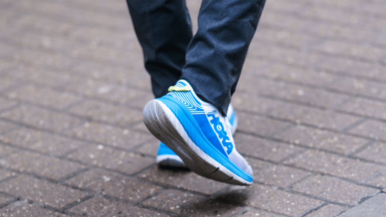 Hoka blue sneakers are seen, during London Fashion Week Men's January 2020 on January 05, 2020 in London, England.