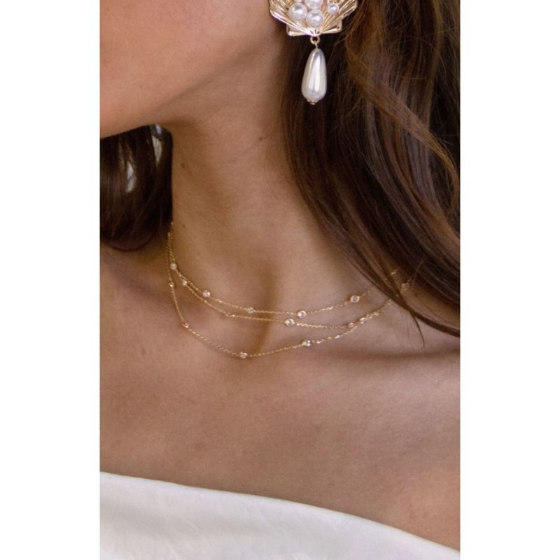 How to Layer Necklaces According to a Stylist