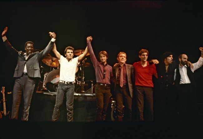 L-R Clarence Clemons, Bruce Springsteen, Garry Tallent, Danny Federici, Max Weinberg, Steven Van Zandt and Roy Bittan take a bow circa 1981.