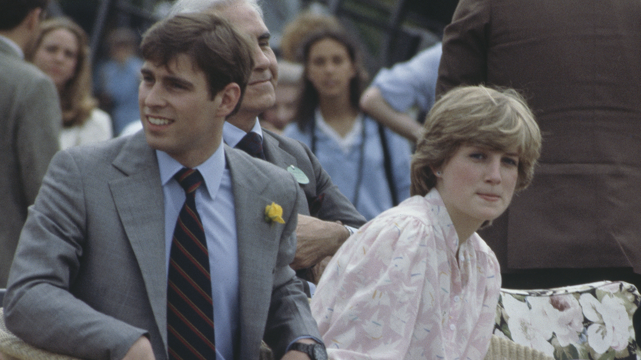 Lady Diana Spencer (1961 - 1997) and her fiancé Prince Charles attend the Cartier International polo match on Smith's Lawn, Windsor, three days before their wedding, 26th July 1981. With them is Prince Andrew (left).
